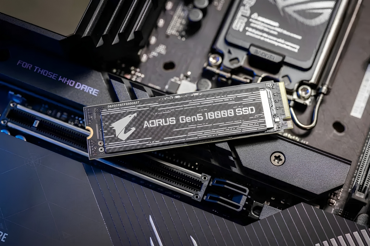 GIGABYTE AORUS Gen5 10000 M.2 NVMe SSD resting on a motherboard