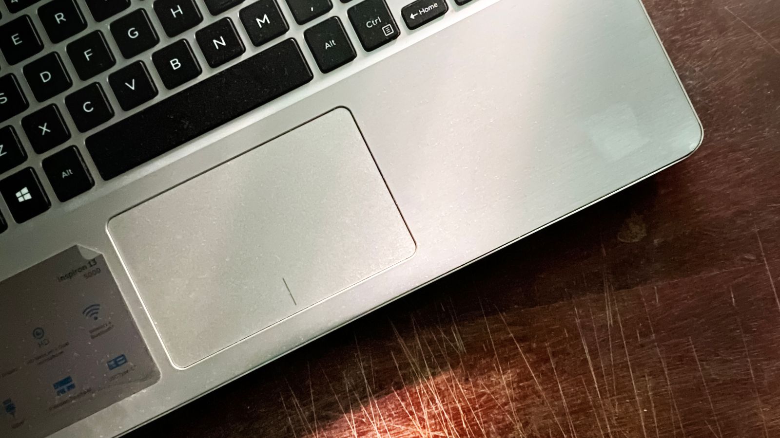Best Laptops Under £500 (2026): Real Picks That Are Actually Worth Buying | Hardvance Close-up of an affordable budget laptop keyboard and trackpad on a desk