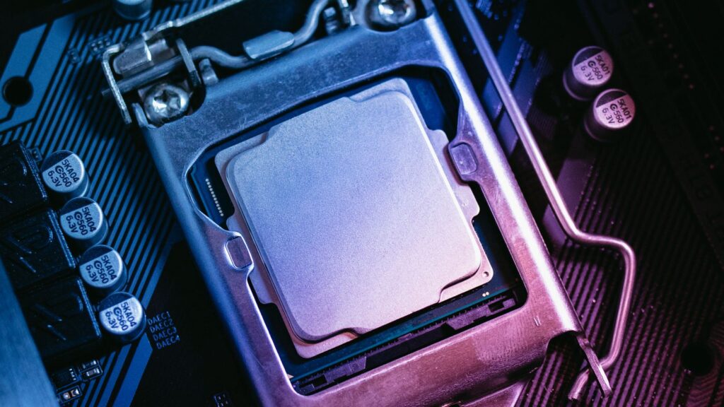 Processor seated in a motherboard CPU socket with the retention bracket closed