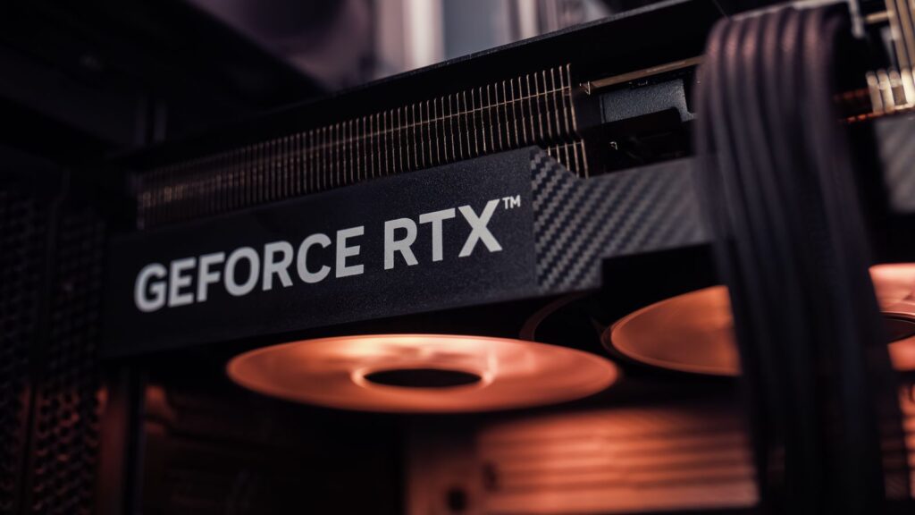 GeForce RTX graphics card glowing inside a gaming PC case