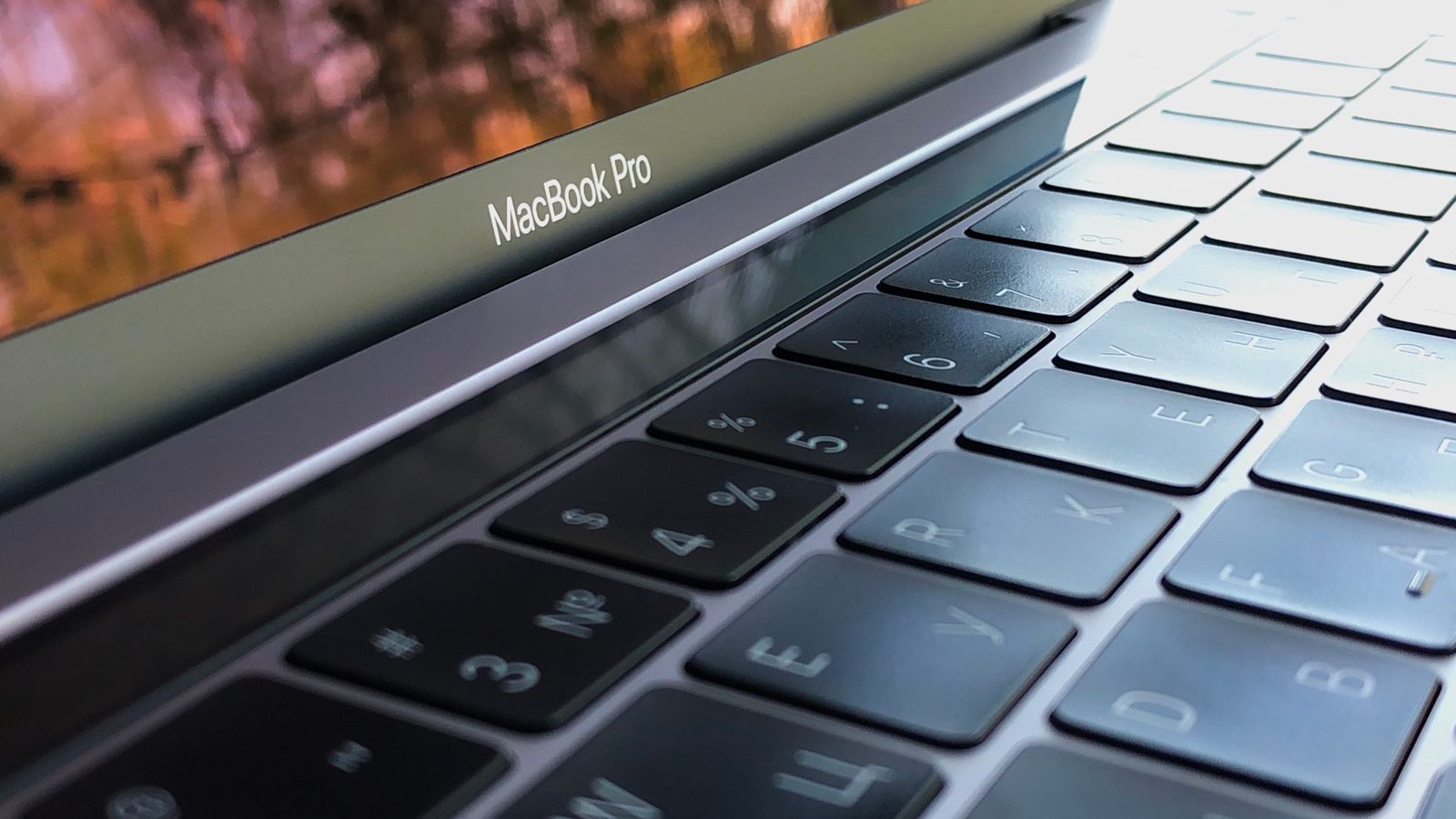 A MacBook Pro keyboard and screen bezel close-up in 2026