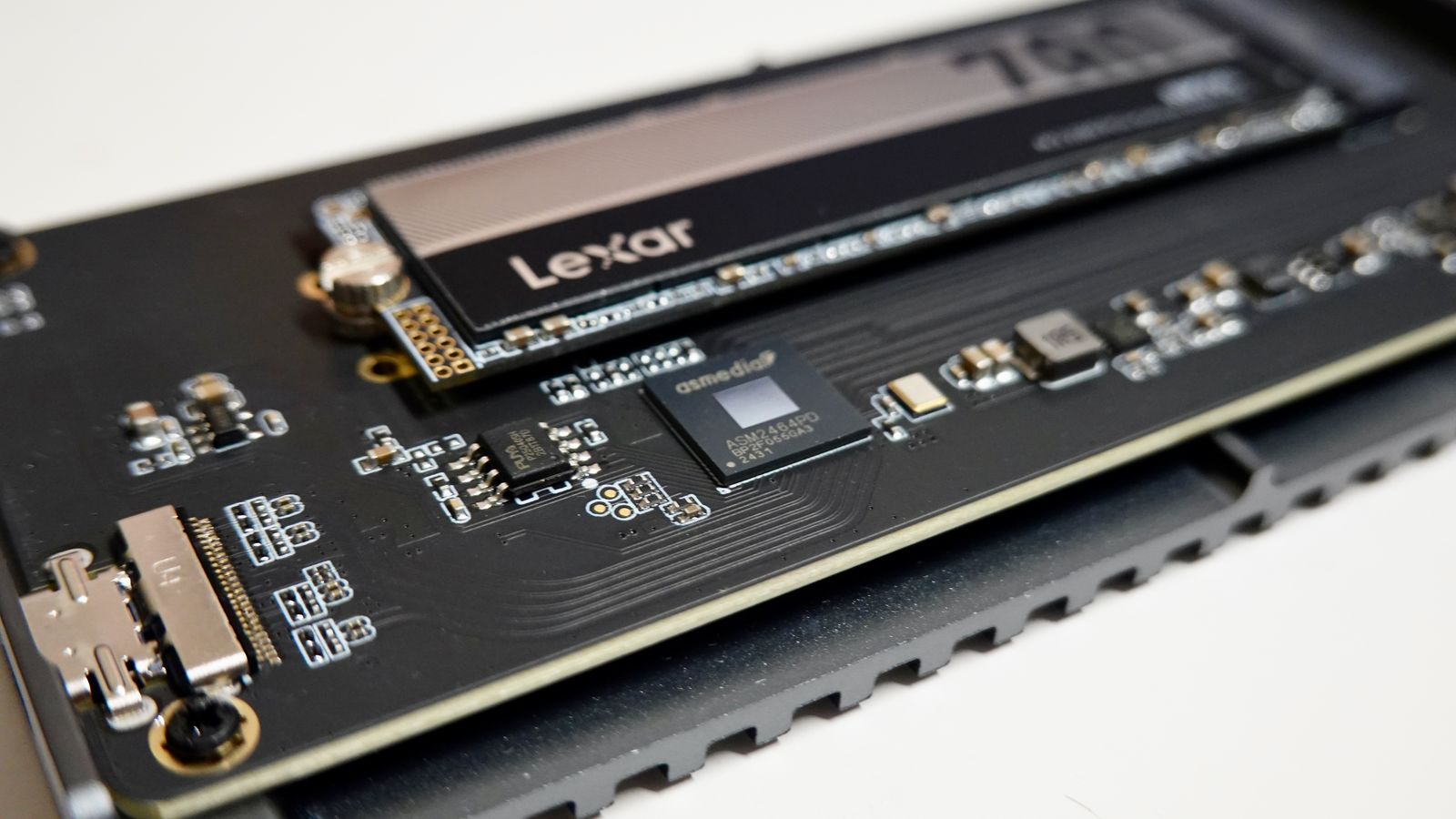 An M.2 NVMe SSD with a heatsink mounted on a circuit board