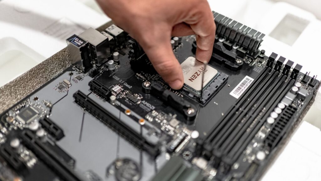 Installing an AMD Ryzen CPU into the motherboard socket while building a PC