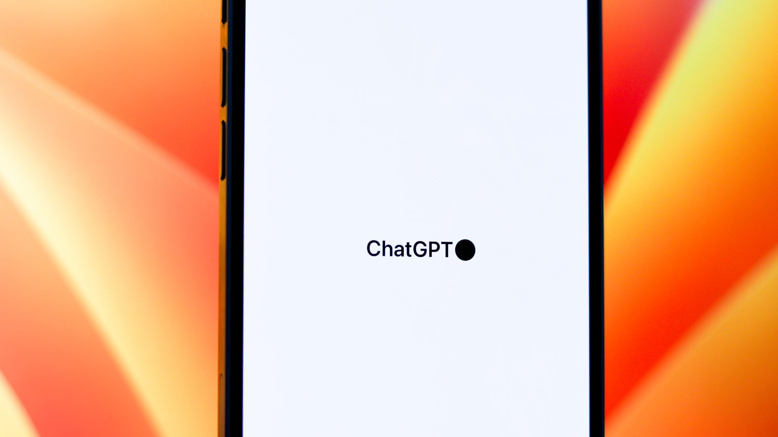 ChatGPT wordmark on a phone screen against an orange background