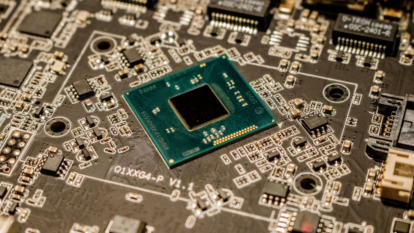 Macro photo of chips and components on a graphics board