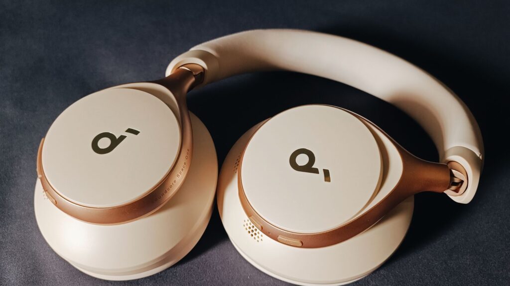 Soundcore Space One noise cancelling headphones in cream and gold