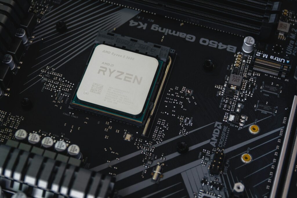 AMD Ryzen 5 3600 processor with its model name printed on the heatspreader, fitted to a B450 motherboard
