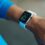 Person checking a smart watch on their wrist