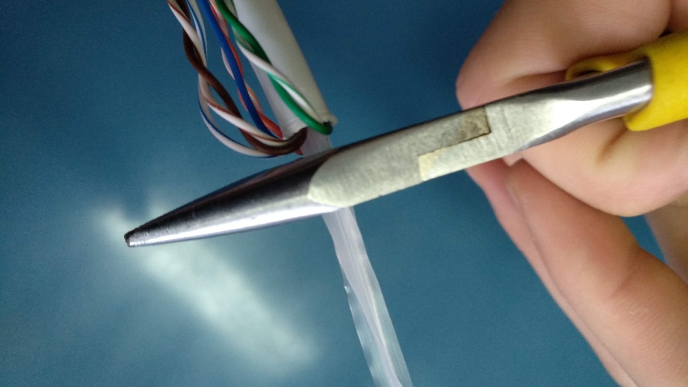 Stripped Ethernet cable showing its four colour-coded twisted pairs