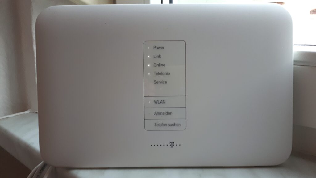 Home wireless router showing its status lights for power, link, online and WLAN