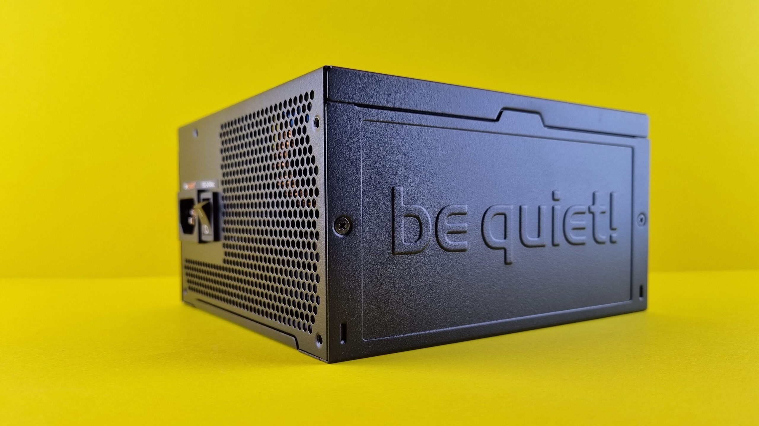 A be quiet! ATX power supply on a yellow background