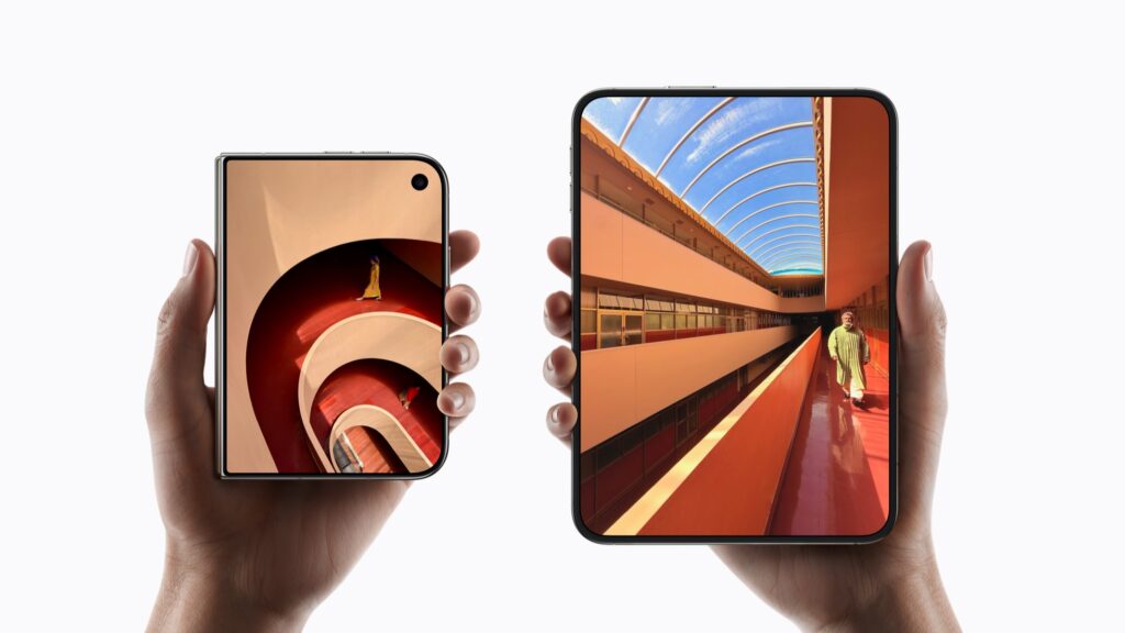 Two hands holding iPhone Duo phones, one closed showing the 5.4-inch outer screen and one open showing the 7.6-inch inner screen